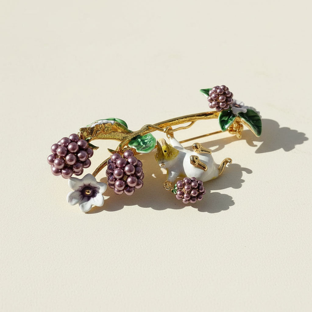 Decorative brooch with berries and flowers on a beige background