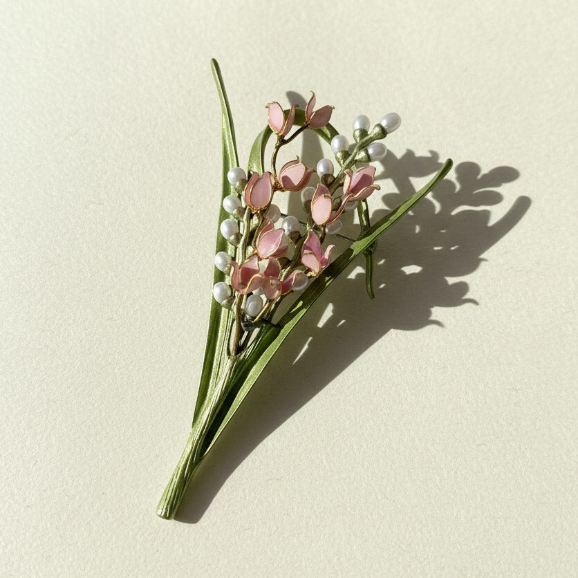 Handcrafted floral brooch in lily of the valley design on brass base