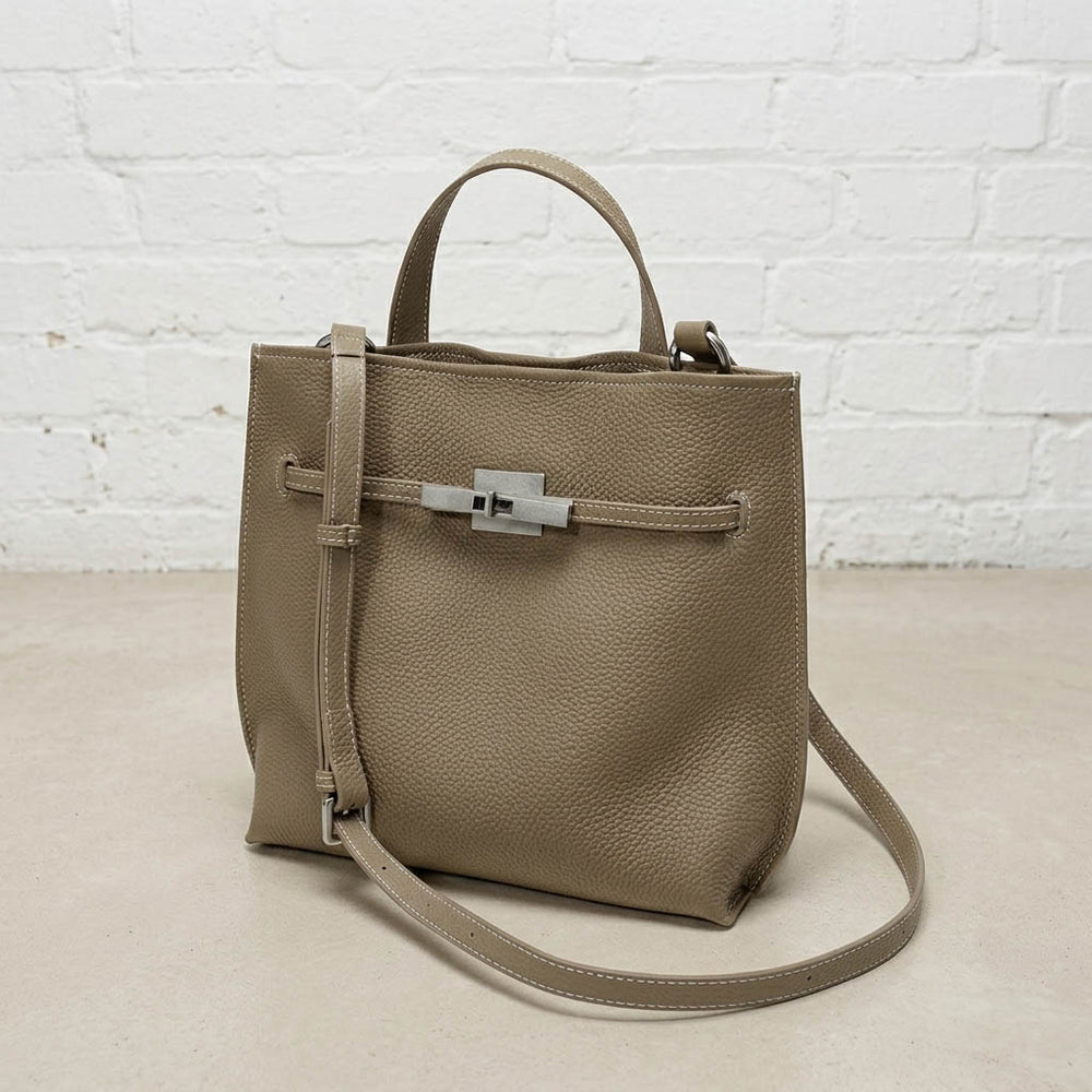 Taupe Soft Grain Mini Shoulder Bag featuring a structured silhouette, front pocket, top handle, and detachable crossbody strap.