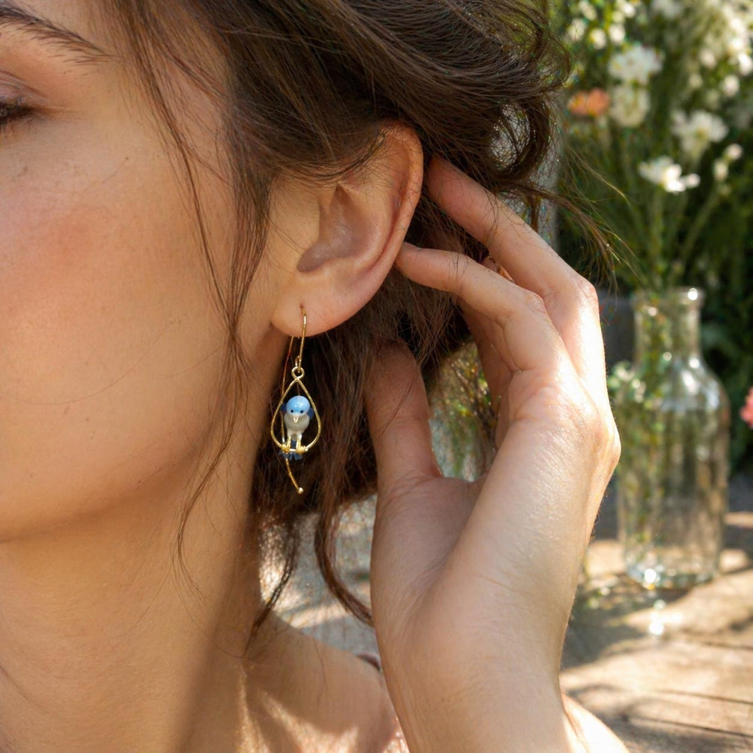 Close-up of a woman wearing an earring with a blurred outdoor background