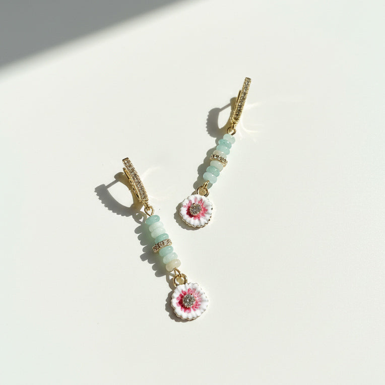 Amazonite and hand-painted enamel flower drop earrings on white background, sunlight and shadow.
