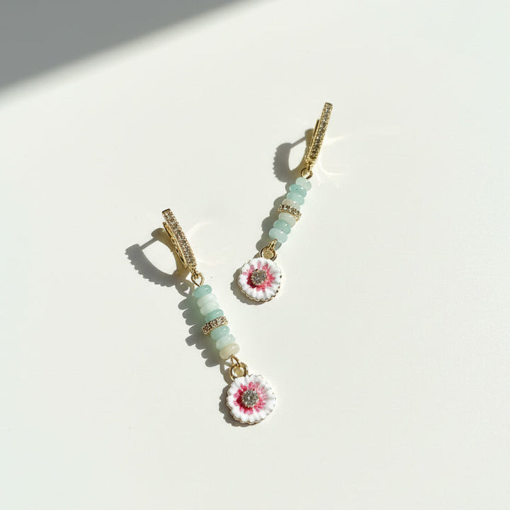 Amazonite and hand-painted enamel flower drop earrings on white background, sunlight and shadow.
