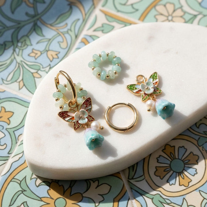 Convertible earring set on a decorative stone surface