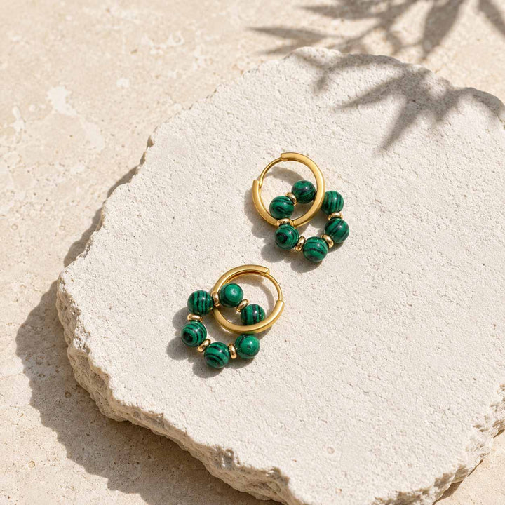 Minimalist convertible hoop earrings with malachite gemstone bead rings and 18K gold-plated hoops.