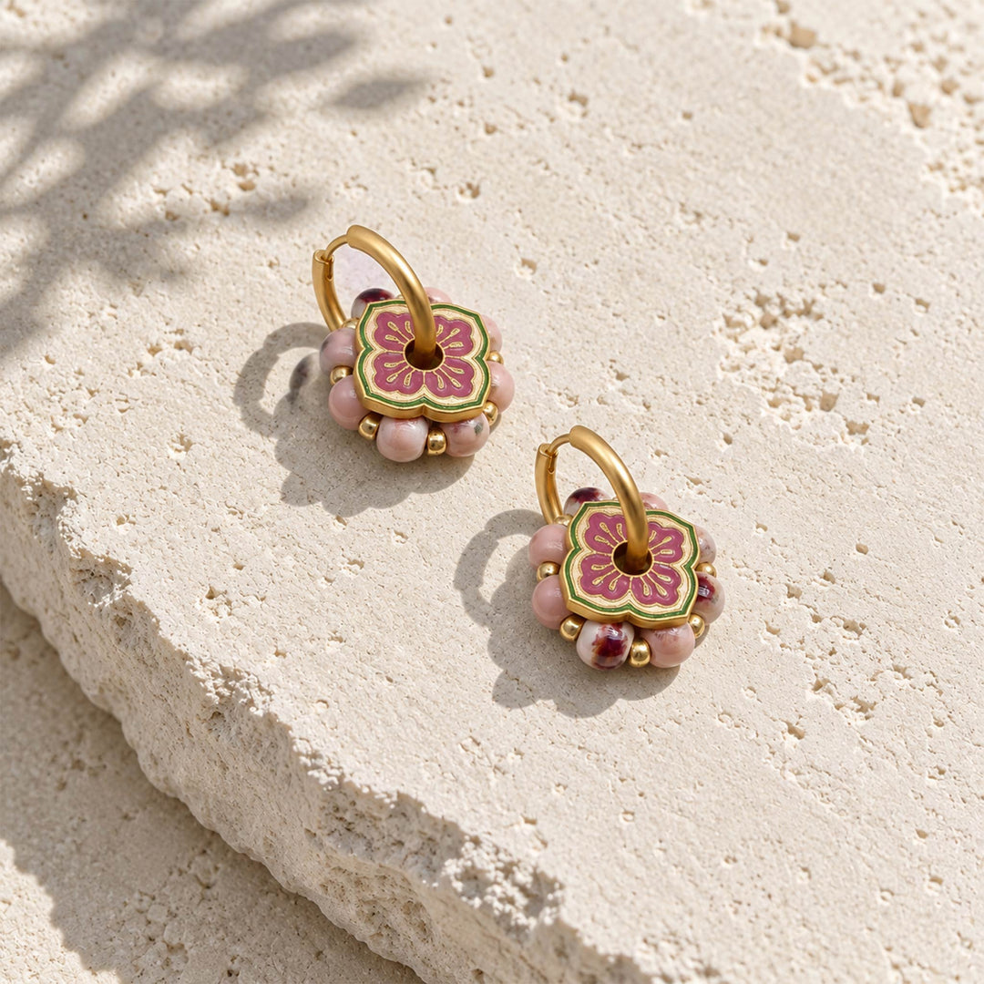 Pink hand-painted porcelain bead convertible hoop earrings with 18K gold-plated hoops.