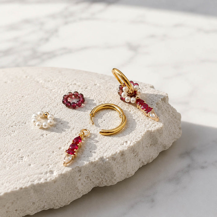 January Garnet convertible huggie earrings with freshwater pearl floral ring, garnet semi-precious stones and CZ glass birthstone charm.