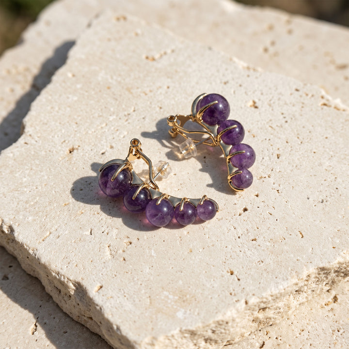 Back view of Amethyst Ear Climber Earrings showing curved gold-plated setting and post closure