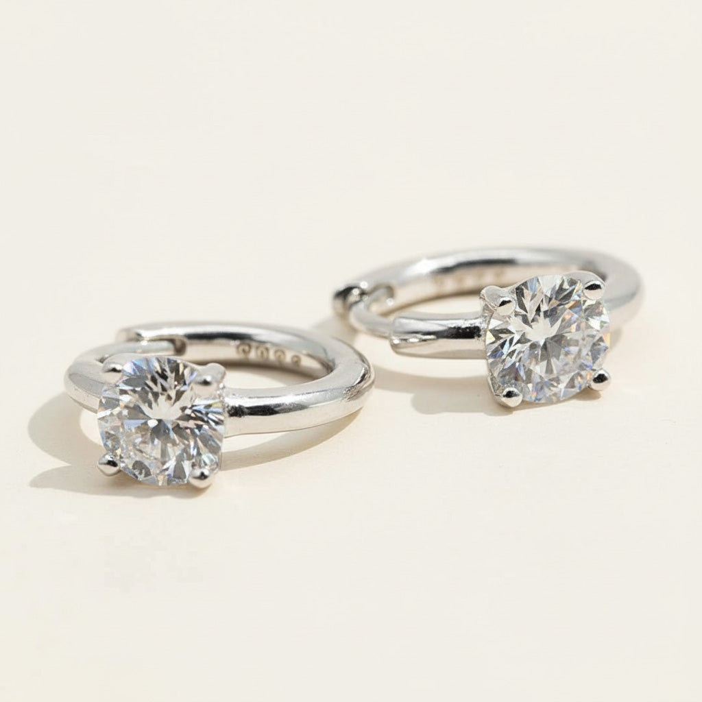 Close-up of 1.0ct D/VVS1 lab-grown diamond hoop earrings in sterling silver