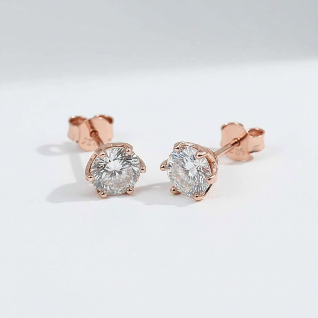 Rose gold-plated S925 stud earrings with 2ct total lab-grown Portuguese-cut diamonds, six-prong setting by A2K London.