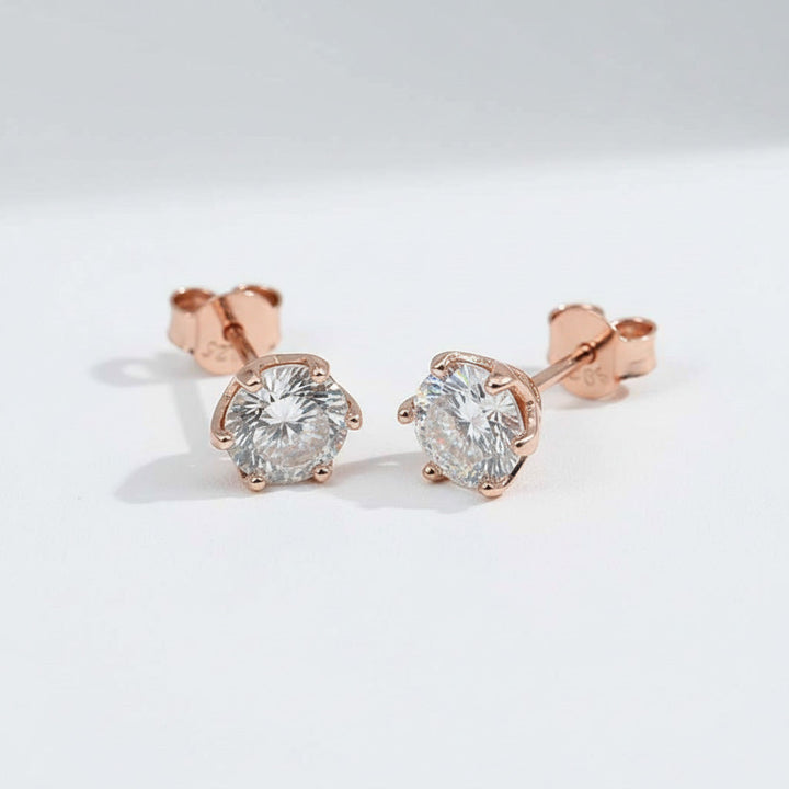 Rose gold-plated S925 stud earrings with 2ct total lab-grown Portuguese-cut diamonds, six-prong setting by A2K London.