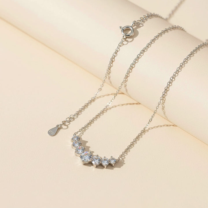 Sterling silver moissanite bar necklace with adjustable chain and secure clasp closure