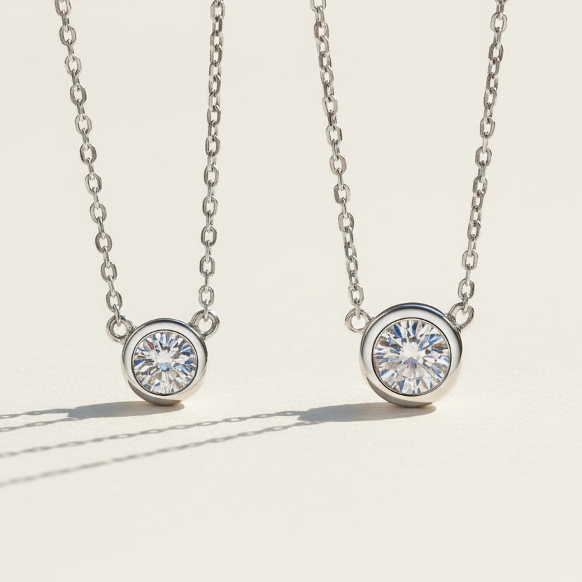 Bezel moissanite necklace in 0.5ct and 1ct size comparison, sterling silver.