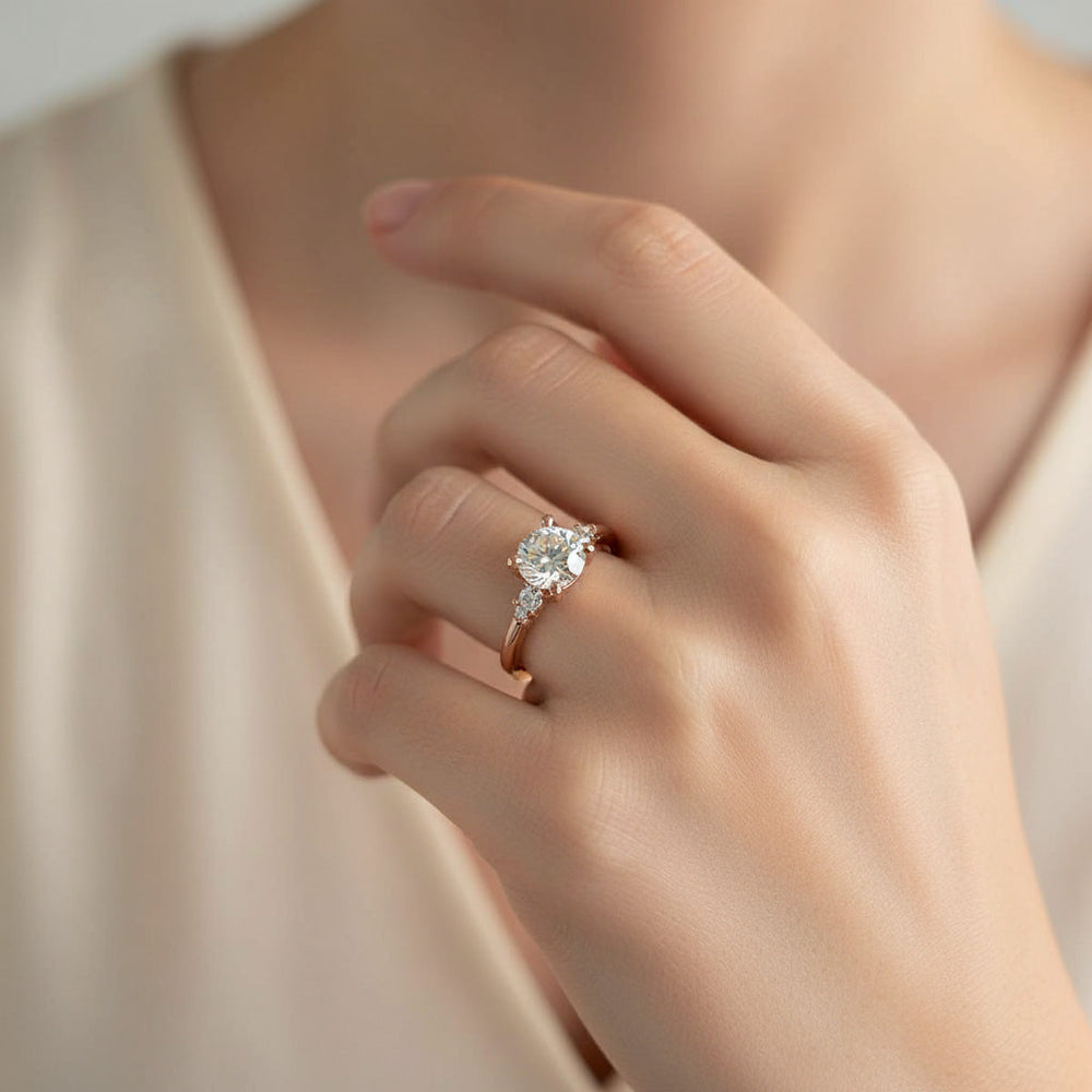 Close-up of rose gold moissanite engagement ring with 2ct round center stone