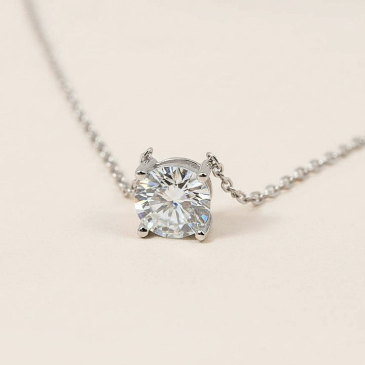 Diamond necklace on a light beige background