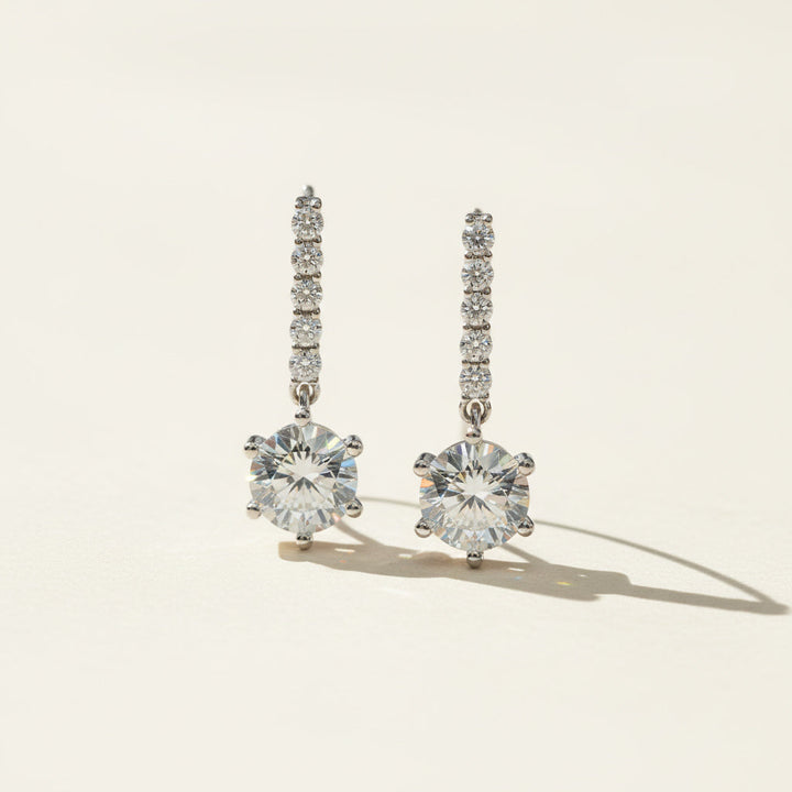 Platinum sterling silver drop earrings with 1ct round moissanite stone