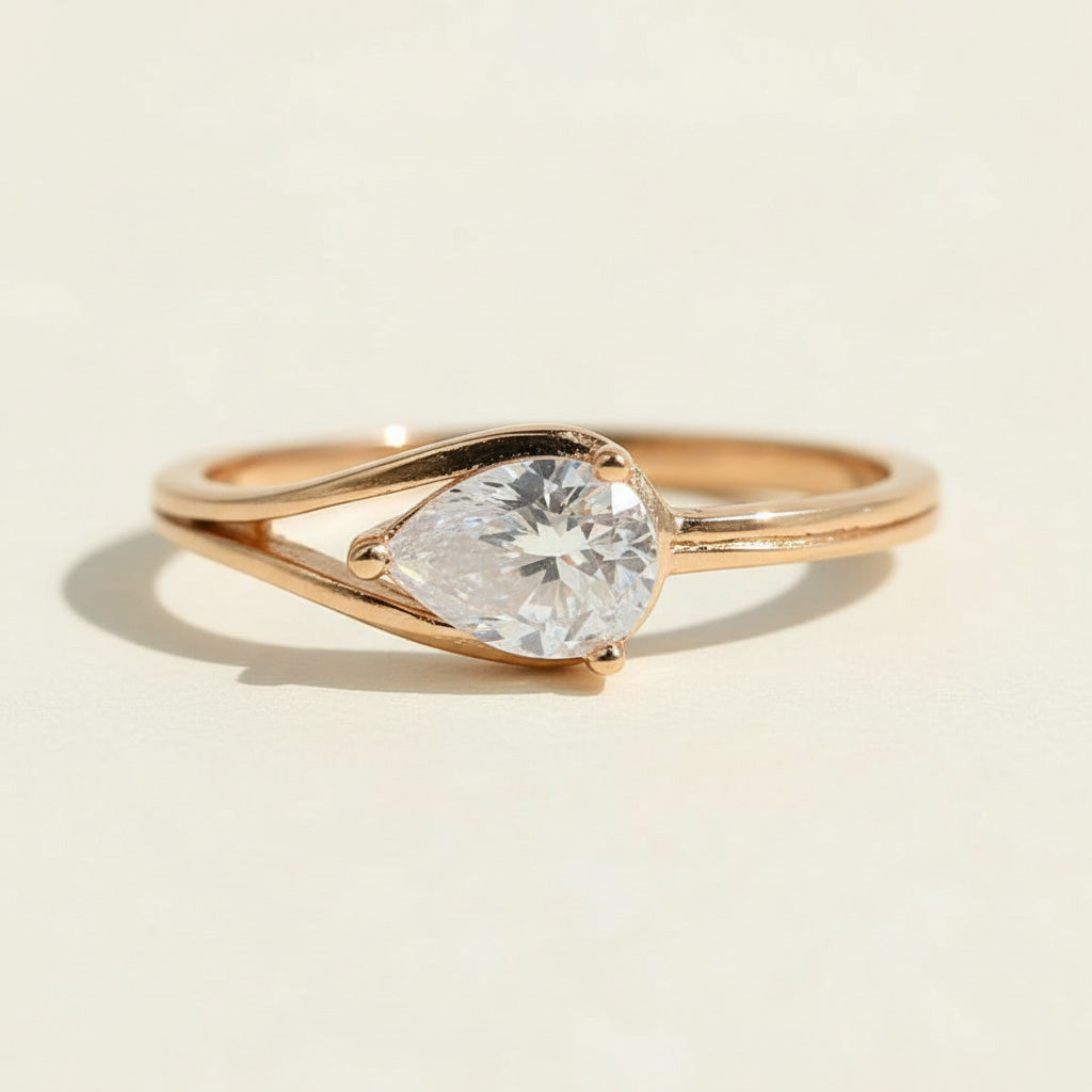 Gold-plated sterling silver pear-cut moissanite engagement ring with split band design, 1.0ct D/VVS1 lab-grown stone