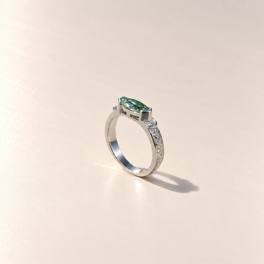 Side profile of green marquise Guardian Eye moissanite ring in platinum-plated 925 sterling silver