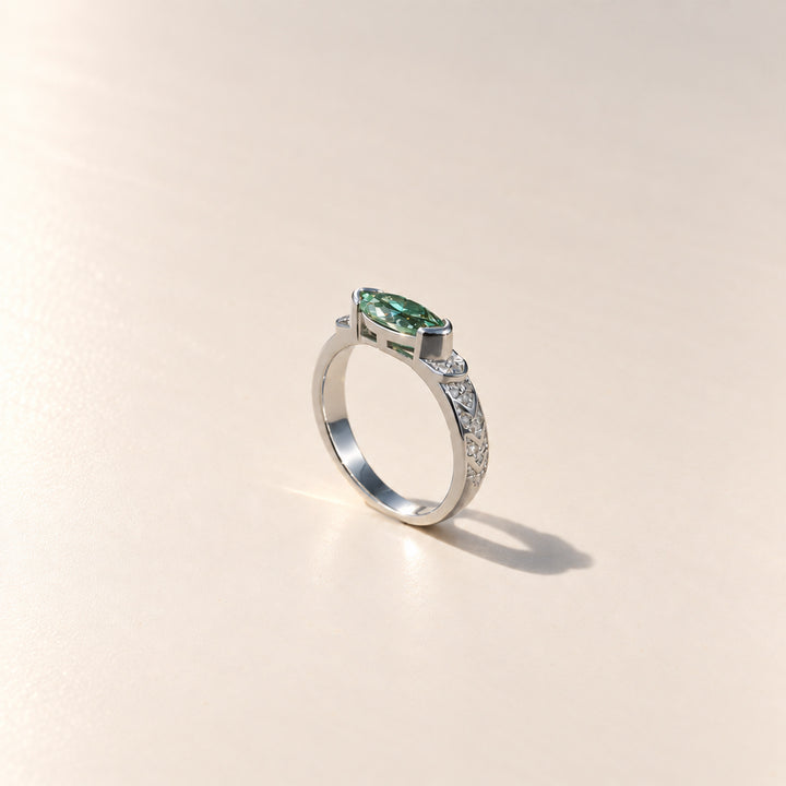 Side profile of green marquise Guardian Eye moissanite ring in platinum-plated 925 sterling silver