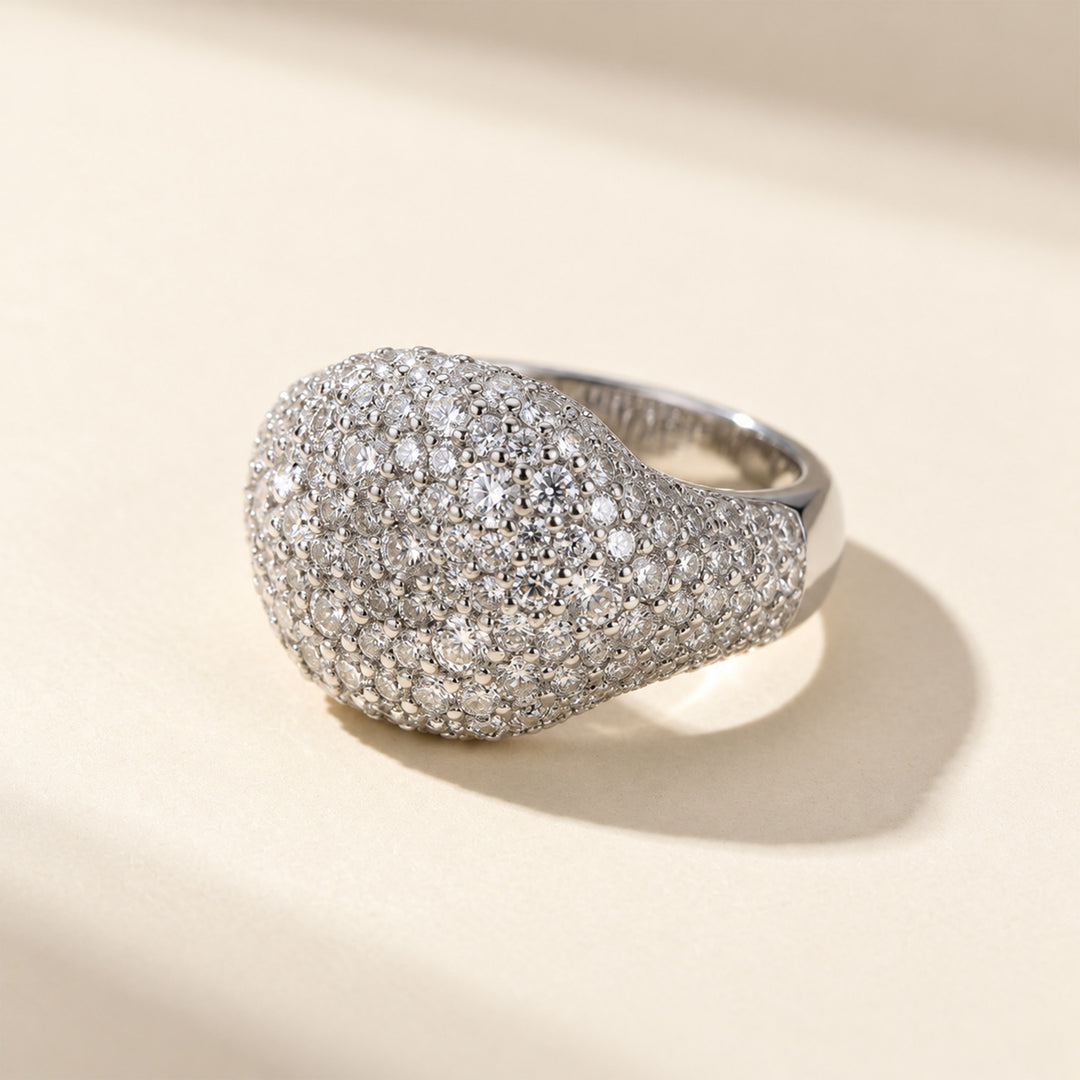 Front view of pavé dome moissanite ring with graduated round VVS1 moissanite stones