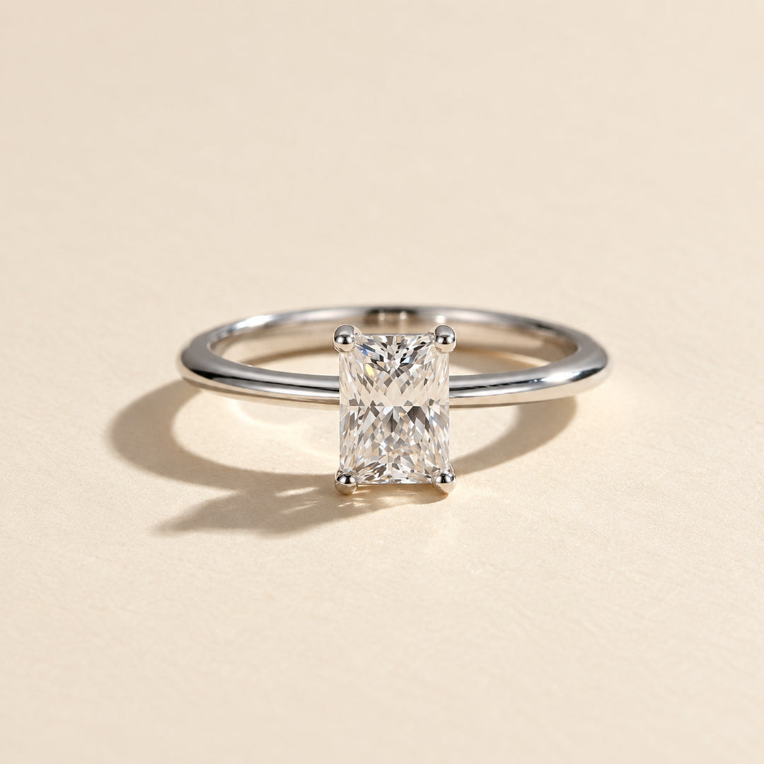 Front view of 1 carat radiant-cut moissanite solitaire ring in polished sterling silver