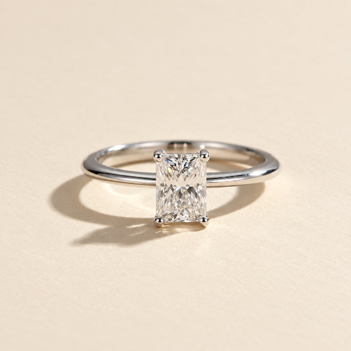 Front view of 1 carat radiant-cut moissanite solitaire ring in polished sterling silver