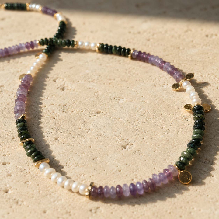 Close-up of 4mm amethyst, Kambaba Jasper and freshwater pearl beads with gold spacer details