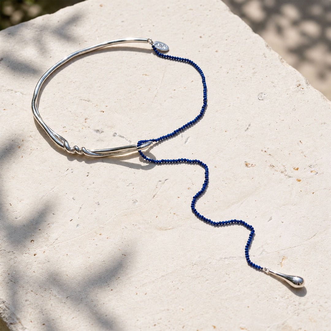 Full Lapis Lazuli Curve Collar Necklace showing asymmetric collar, gemstone strand and teardrop pendant