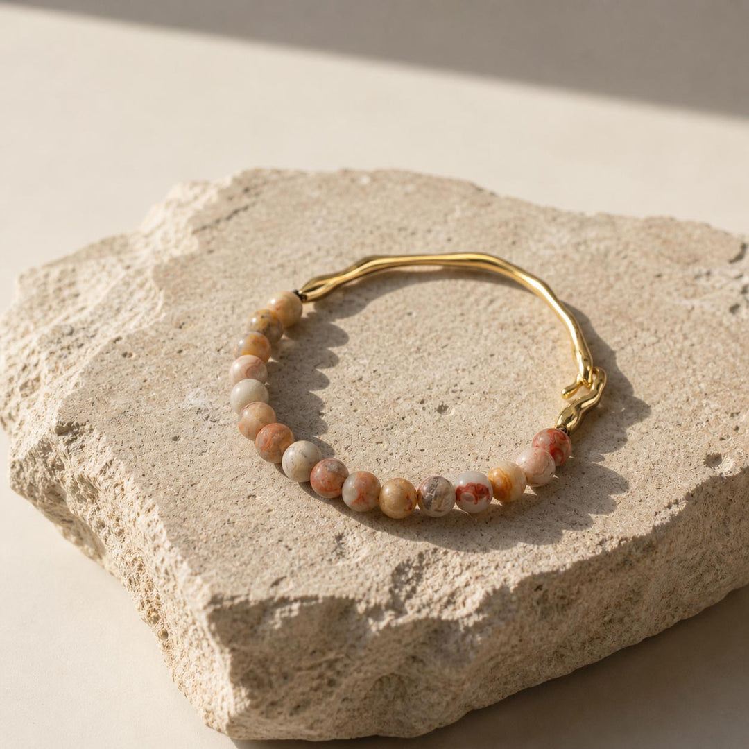 Neutral toned gemstone hook bracelet with matte stone beads and gold accents