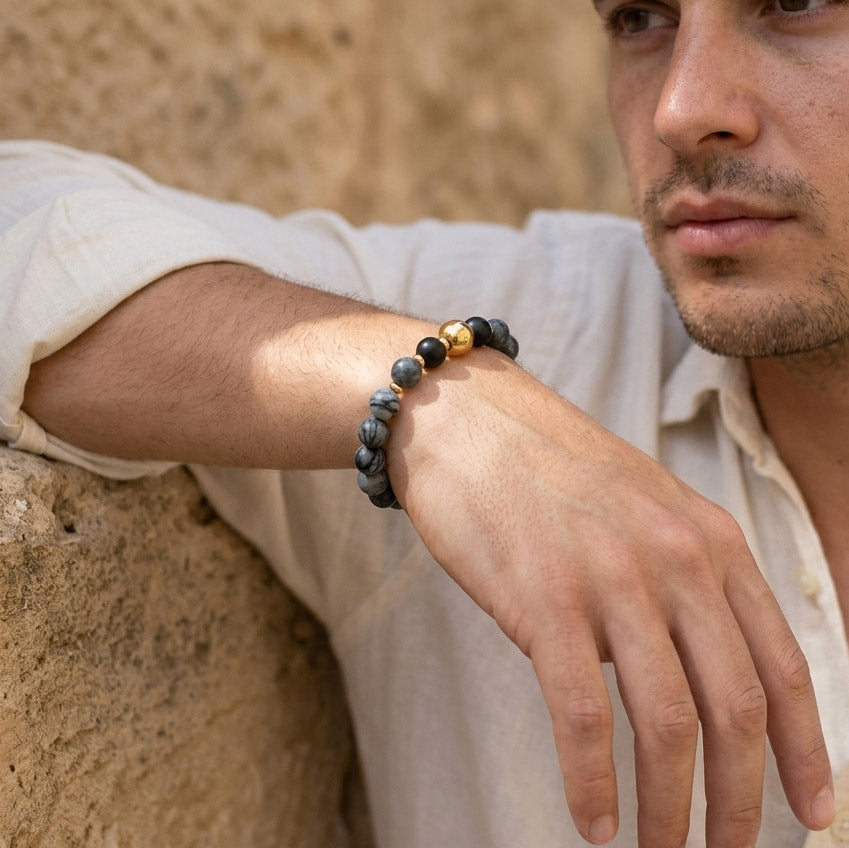 Man wearing matte zebra jasper and black onyx stretch bracelet