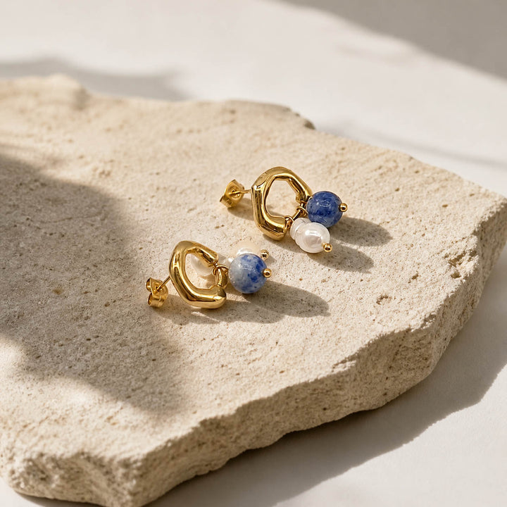 Sodalite gemstone and freshwater pearl earrings with gold detail
