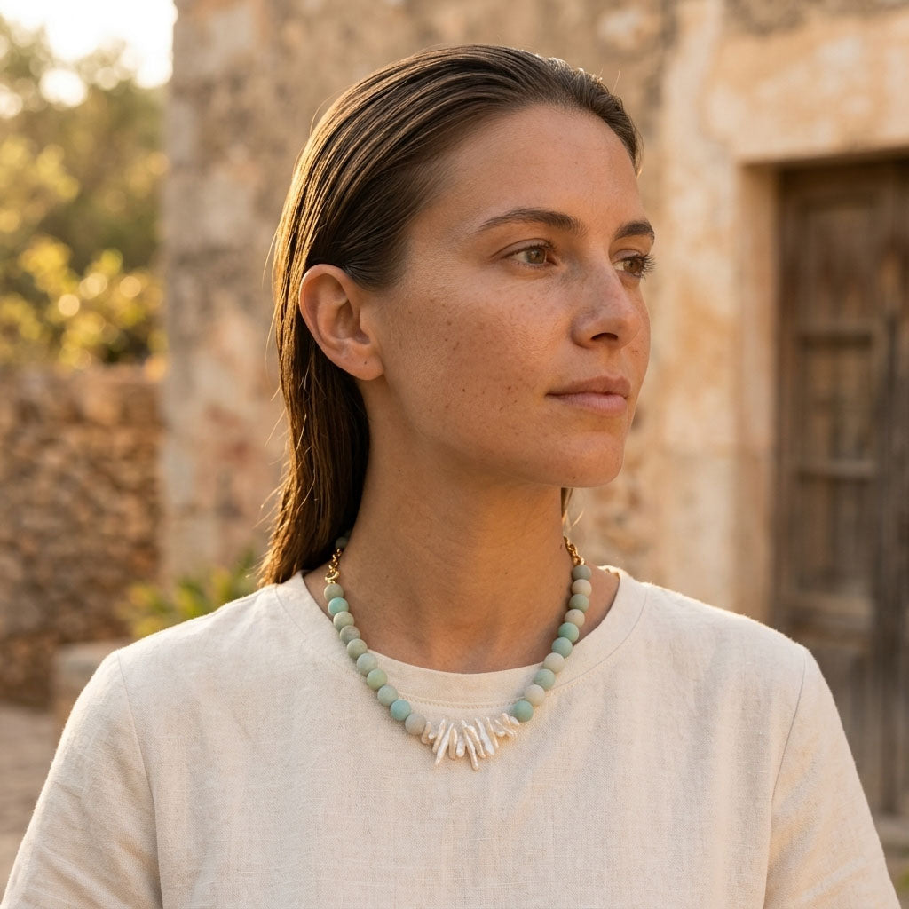 Model wearing amazonite pearl necklace in natural sunlight