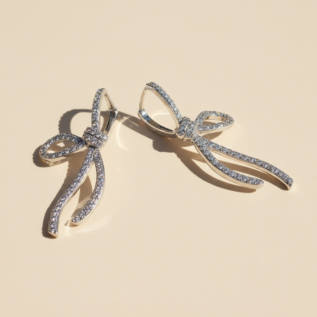 Bow Moissanite Drop Earrings in Platinum Plated Silver