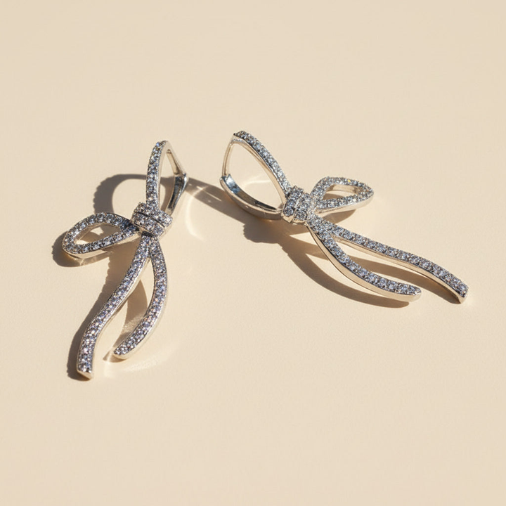 Bow Moissanite Drop Earrings in Platinum Plated Silver