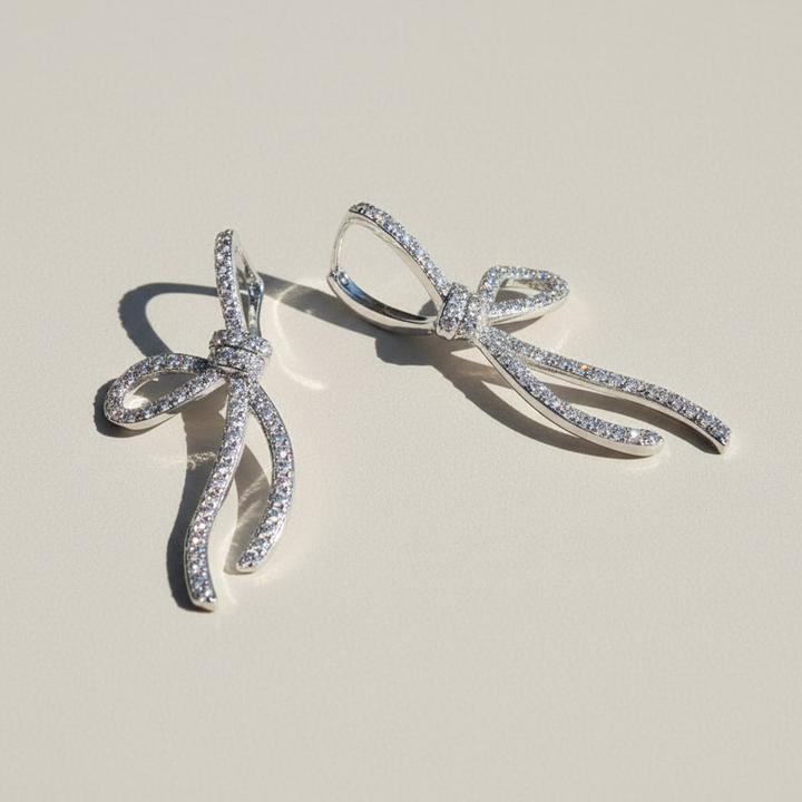 Bow Moissanite Drop Earrings in Platinum Plated Silver