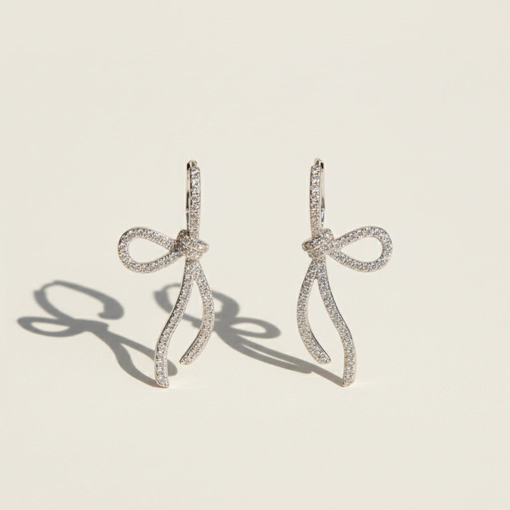 Bow Moissanite Drop Earrings in Platinum Plated Silver