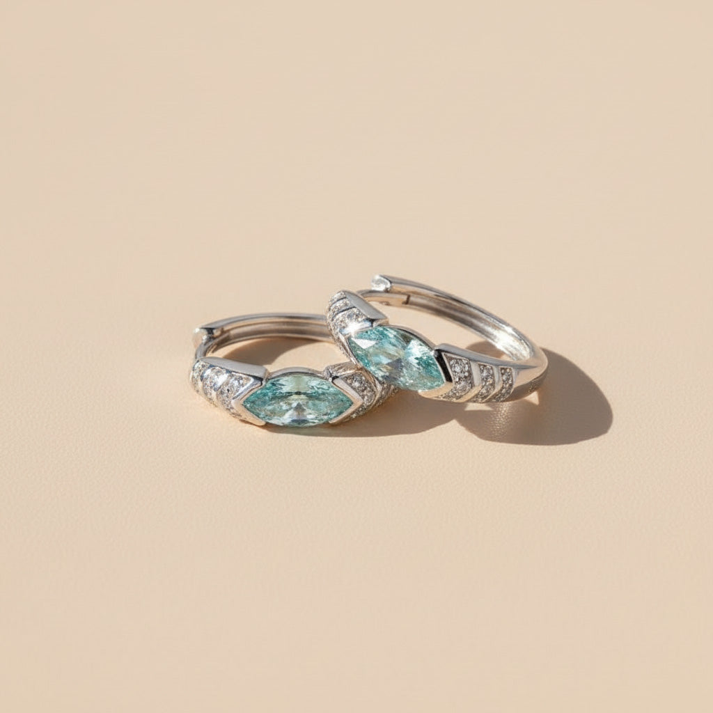 Topaz Blue Moissanite Huggie Earrings